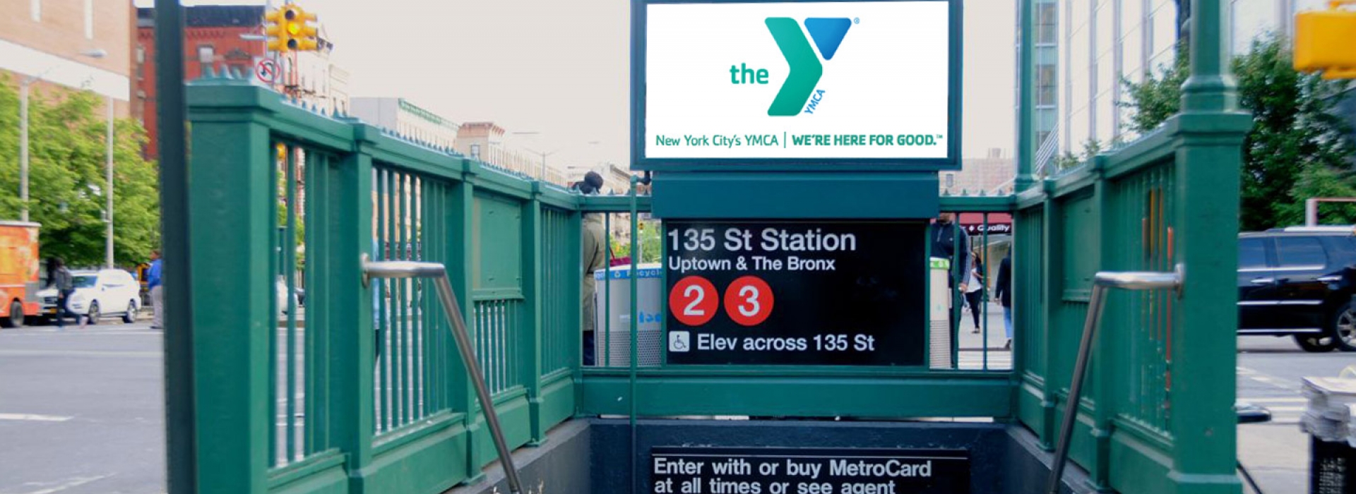 An ad for the YMCA at the Harlem 135 St. Subway station.