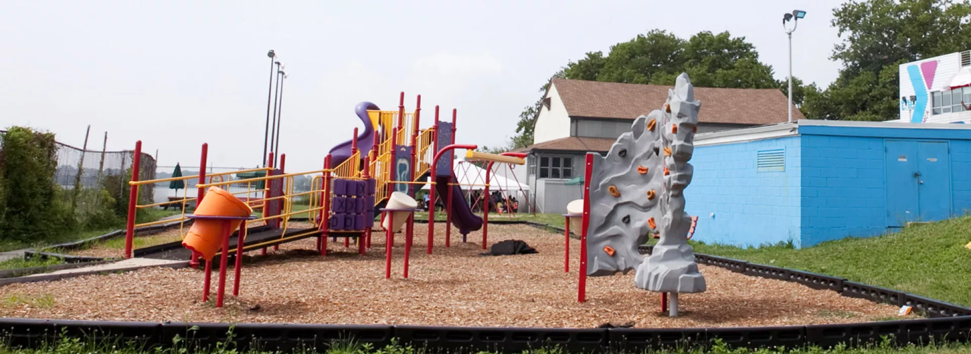 A colorful outdoor playground at the Bronx YMCA.