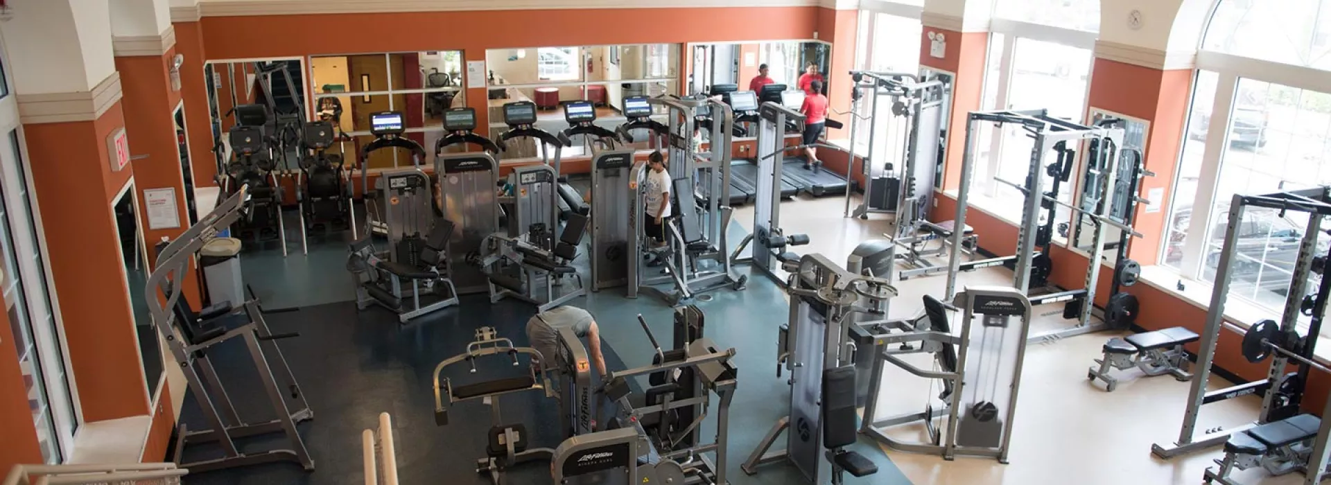 Gym equipment and strength training machines in Ridgewood YMCA fitness center in Queens