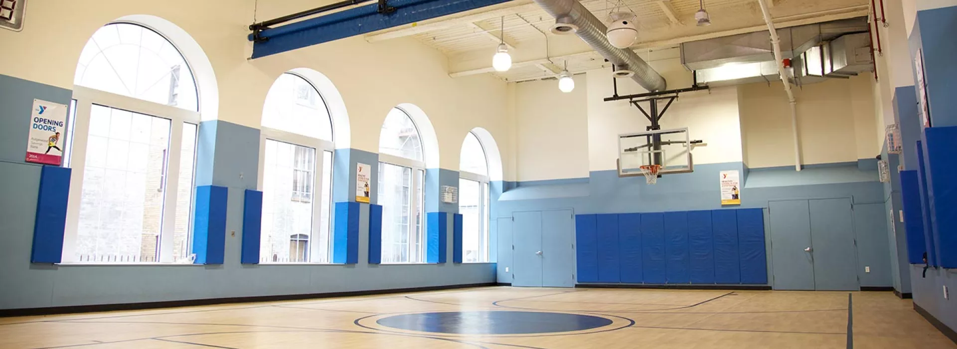 Indoor basketball court at Ridgewood YMCA in Queens