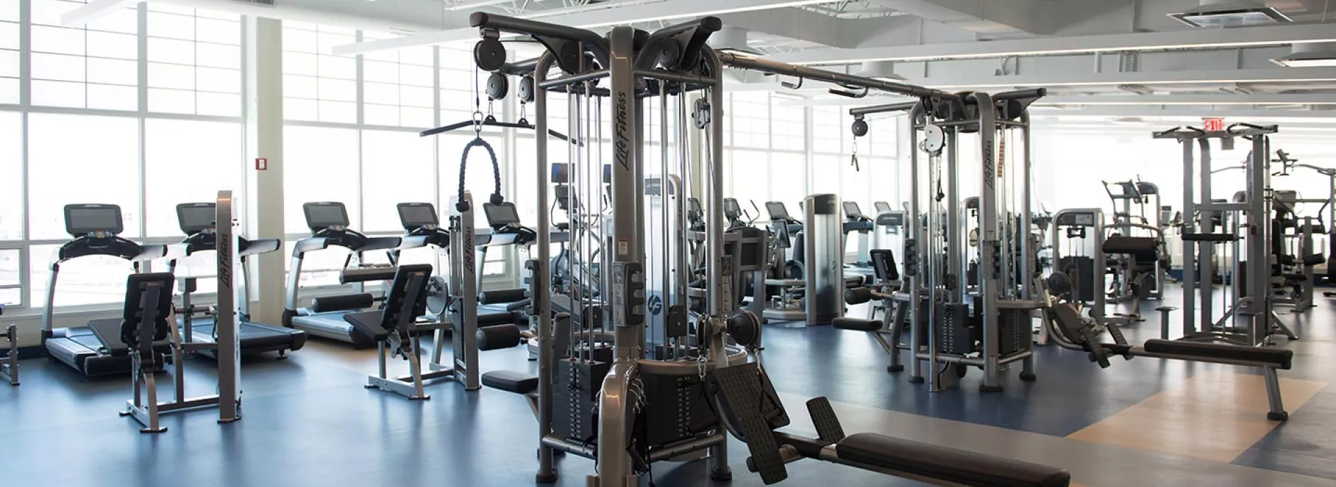 Fitness center with strength training equipment at the Rockaway YMCA in Queens