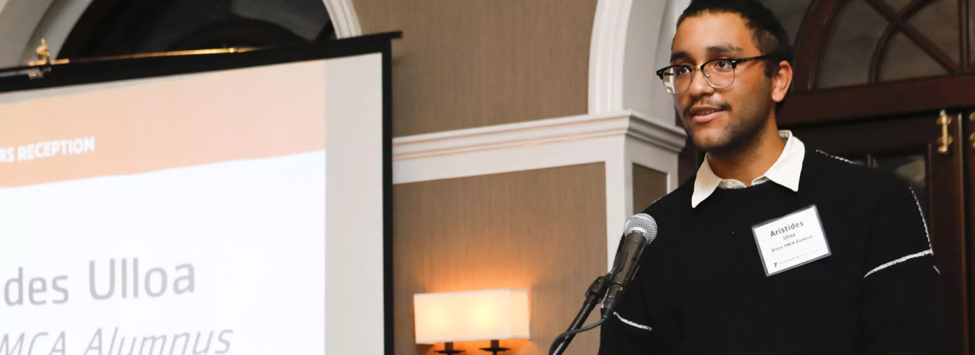 A young man speaks at the Hispanic Achievers event for the YMCA of Greater New York.