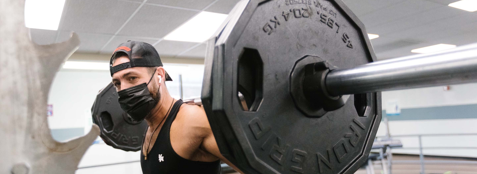 Long Island City YMCA Male lifting weight
