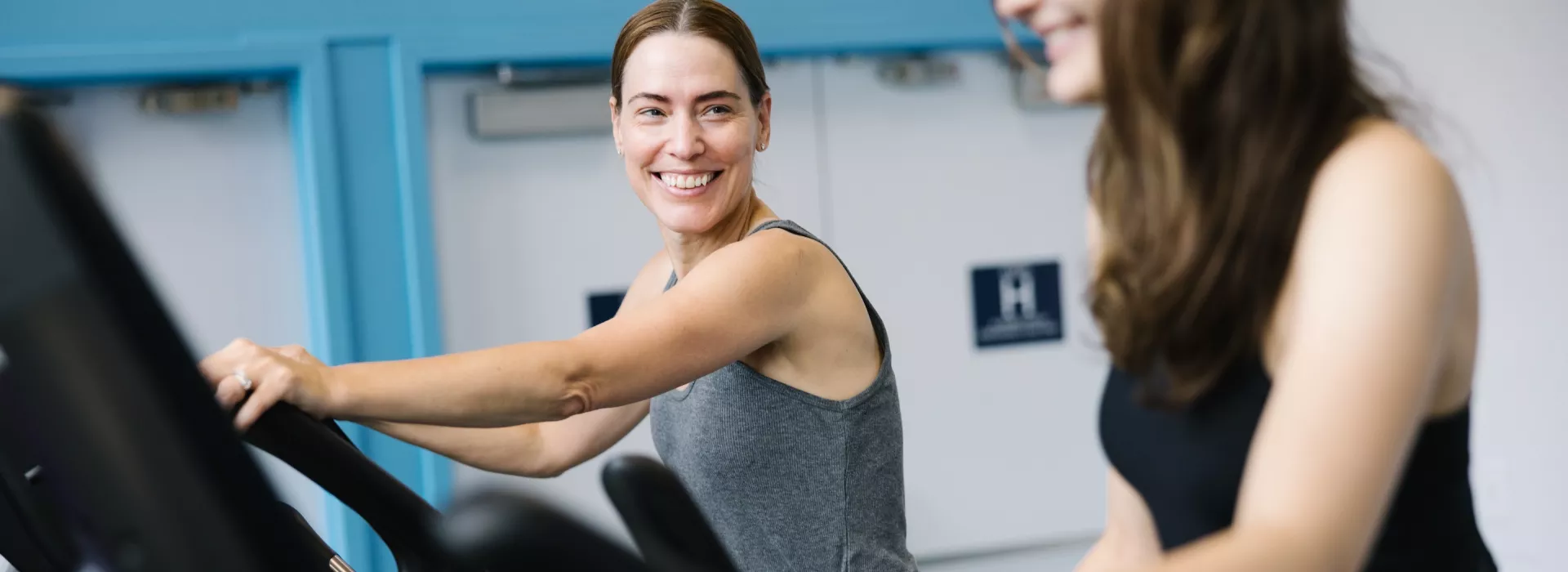2 women on treadmills