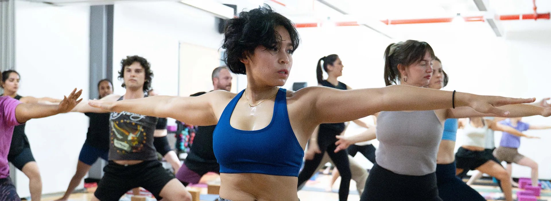 woman doing yoga in class