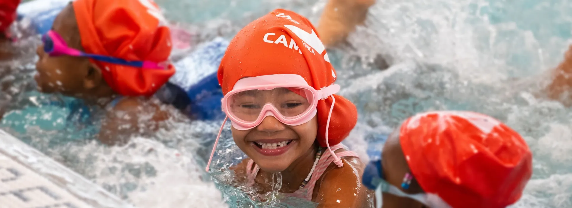 girl smiling in pool